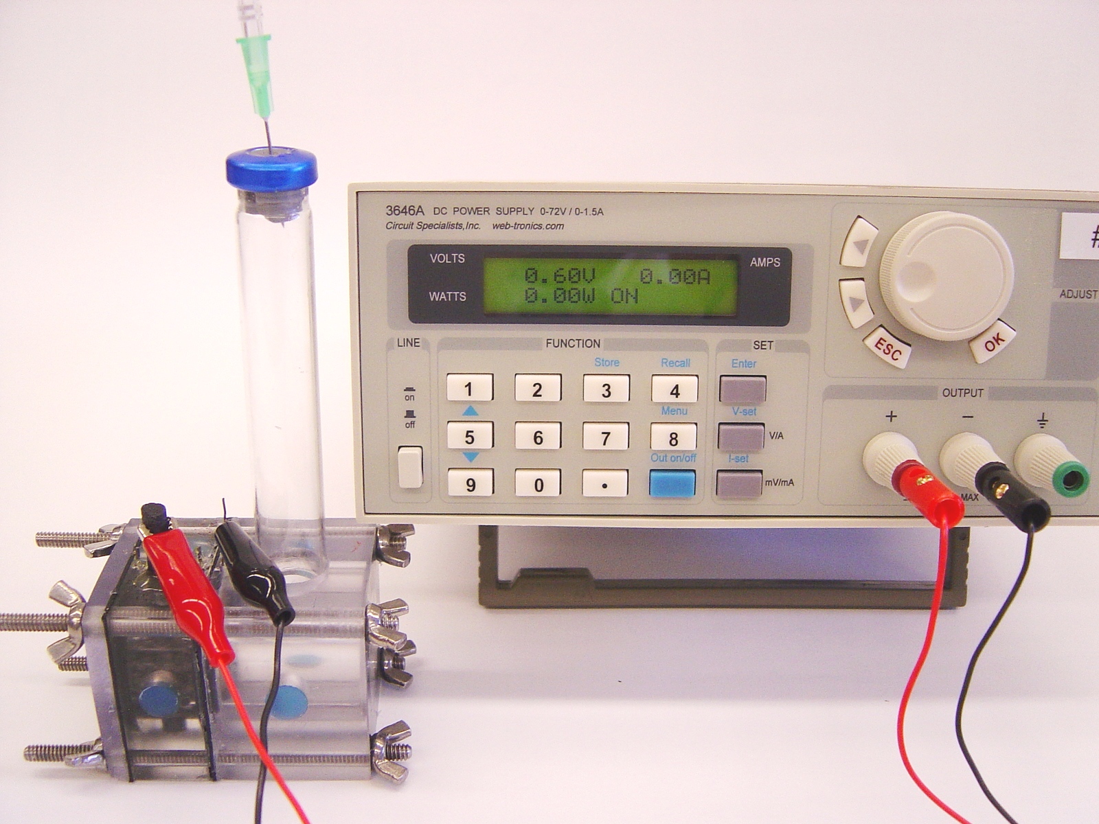 A microbial electrolysis cell (MEC) shown with a power source used to boost bacterial coltage.